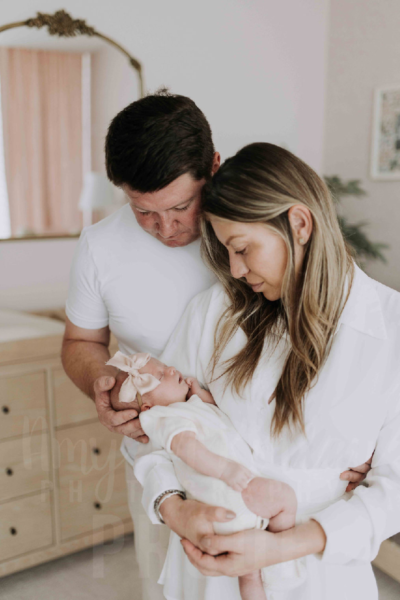 Newborn baby Layla Rose Johnson smilin